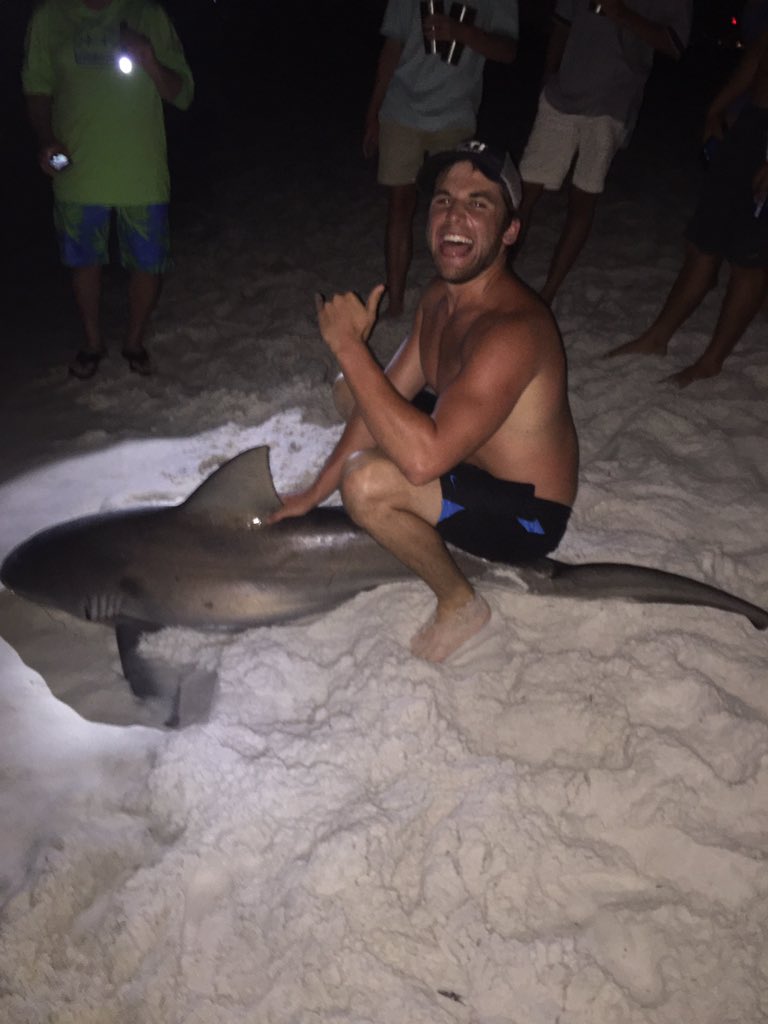 PayneLiotta's tweet photo. When you can't decide what the best way to pose with a shark is https://t.co/zMbewAaXGq