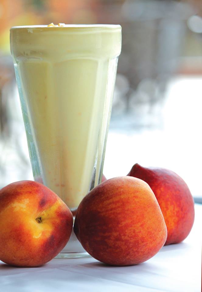 Peach Shakes are BACK for the summer! Made with real vanilla ice cream and hand-blended with fresh peaches.