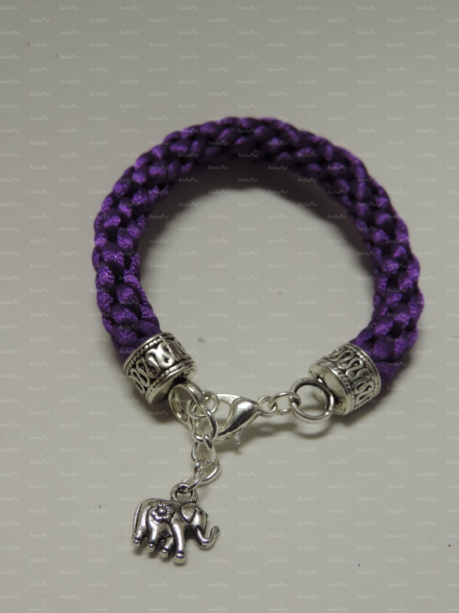 detallesrut's tweet photo. pulsera kumihimo morada para  #niñosyniñas de forma #artesanal con cordón 2mm y colgante de #elefante de la #suerte https://t.co/dryB2LSXdz