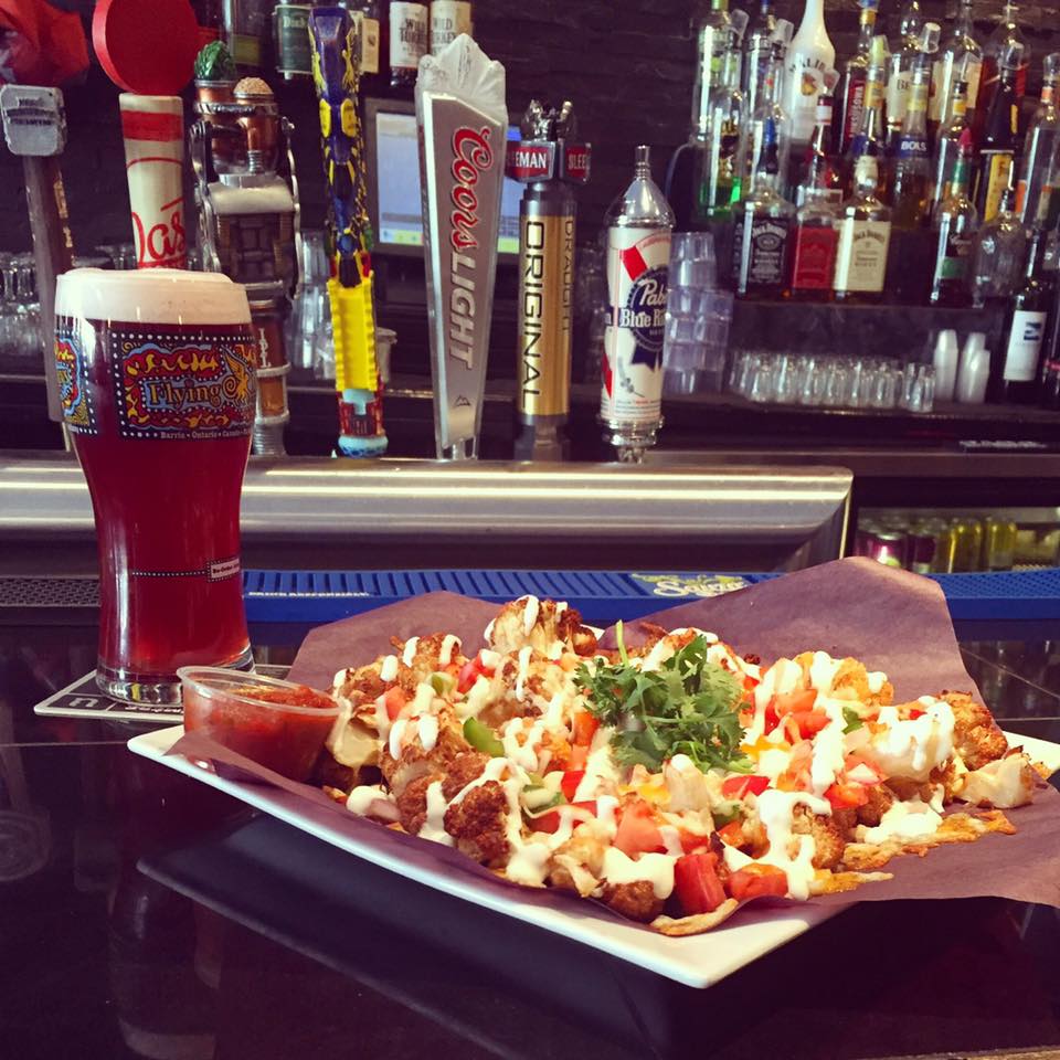 FiddlersP's tweet photo. Our special cauliflower nachos and a pint of PBR for $20 today! https://t.co/ArROd9J4l4