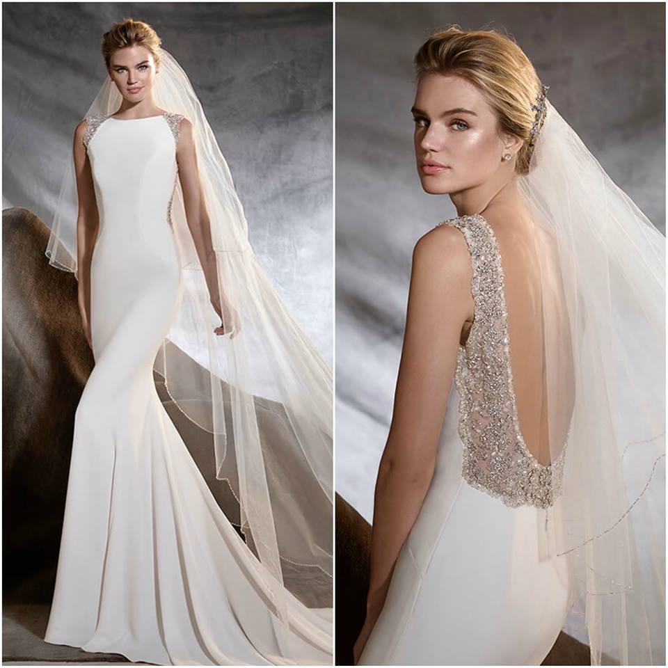 4PoffieGirls's tweet photo. Swooning over this crepe and tulle sheath with jewel embellishment Pronivious Gown! #Pronovias #poffiegirls https://t.co/KphTJ8YqPA