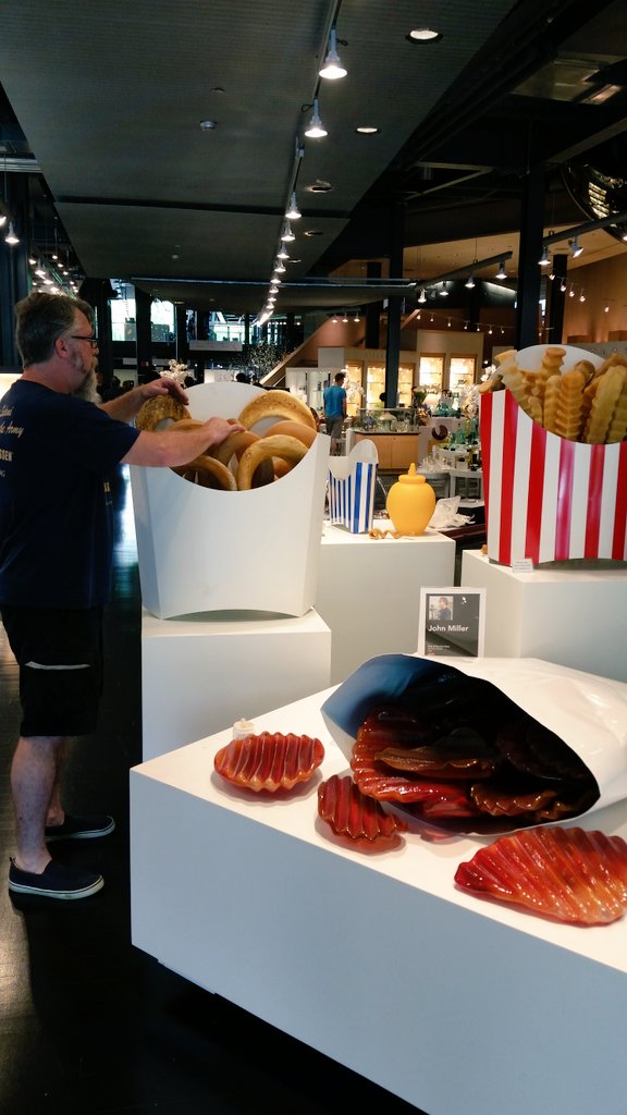 John Miller was here this morning setting up a display of #glass food in the shops. Getting ready for #GASCorning!