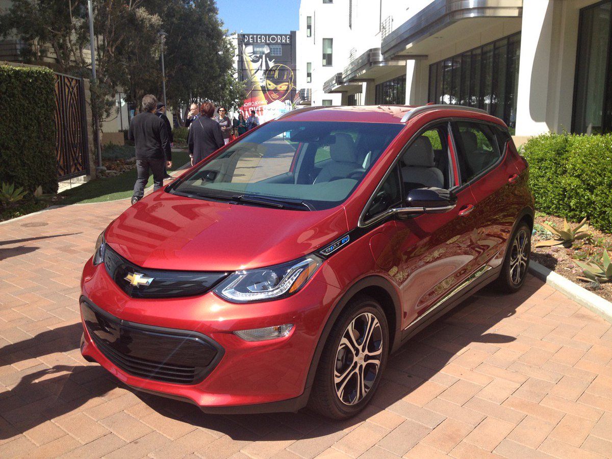 JustinBomberg's tweet photo. As a happy @ChevyVolt owner, thrilled to see a new #ChevyBolt in person at #ProducedBy2016. Thanks @chevrolet! https://t.co/OwUzg3qgRy