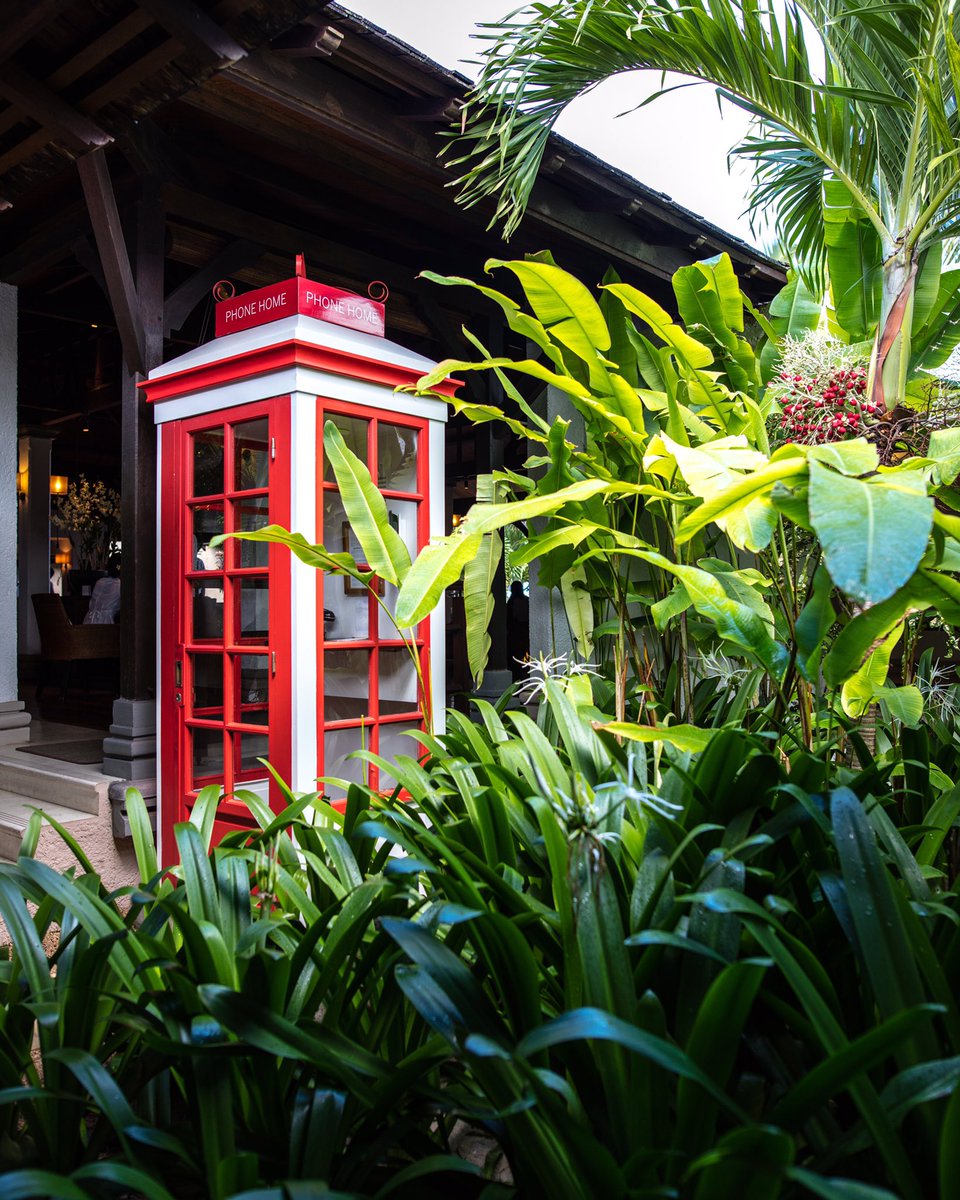 The red phone booth catches your eye as you realise that you’ve forgotten to call home for a while 📷by <a href="/garethpon/">Gareth Pon</a>