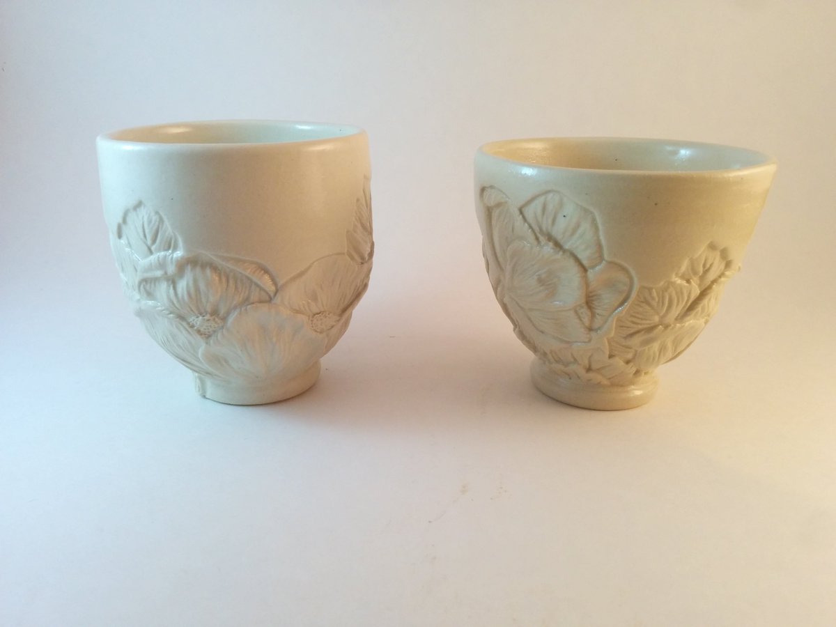 johnson_sydnie's tweet photo. Fresh out of the kiln. #Stoneware #yunomis with detailed #handcarved #wildroses https://t.co/1i8S8RnJhU