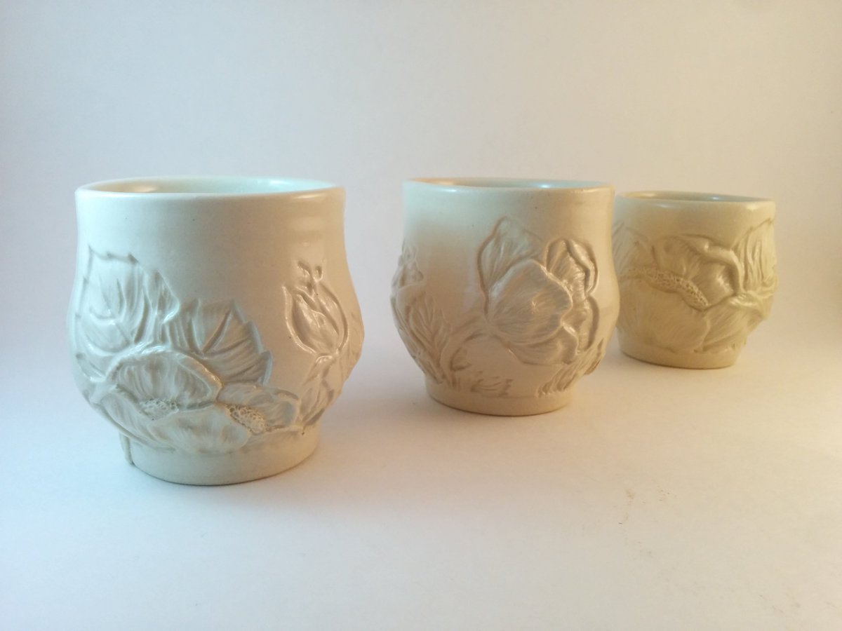 johnson_sydnie's tweet photo. Fresh out of the kiln. #Stoneware #yunomis with detailed #handcarved #wildroses https://t.co/1i8S8RnJhU