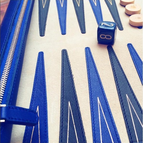 SPCCollection's tweet image. Hiding from the #rain in #London - game of #backgammon anyone?