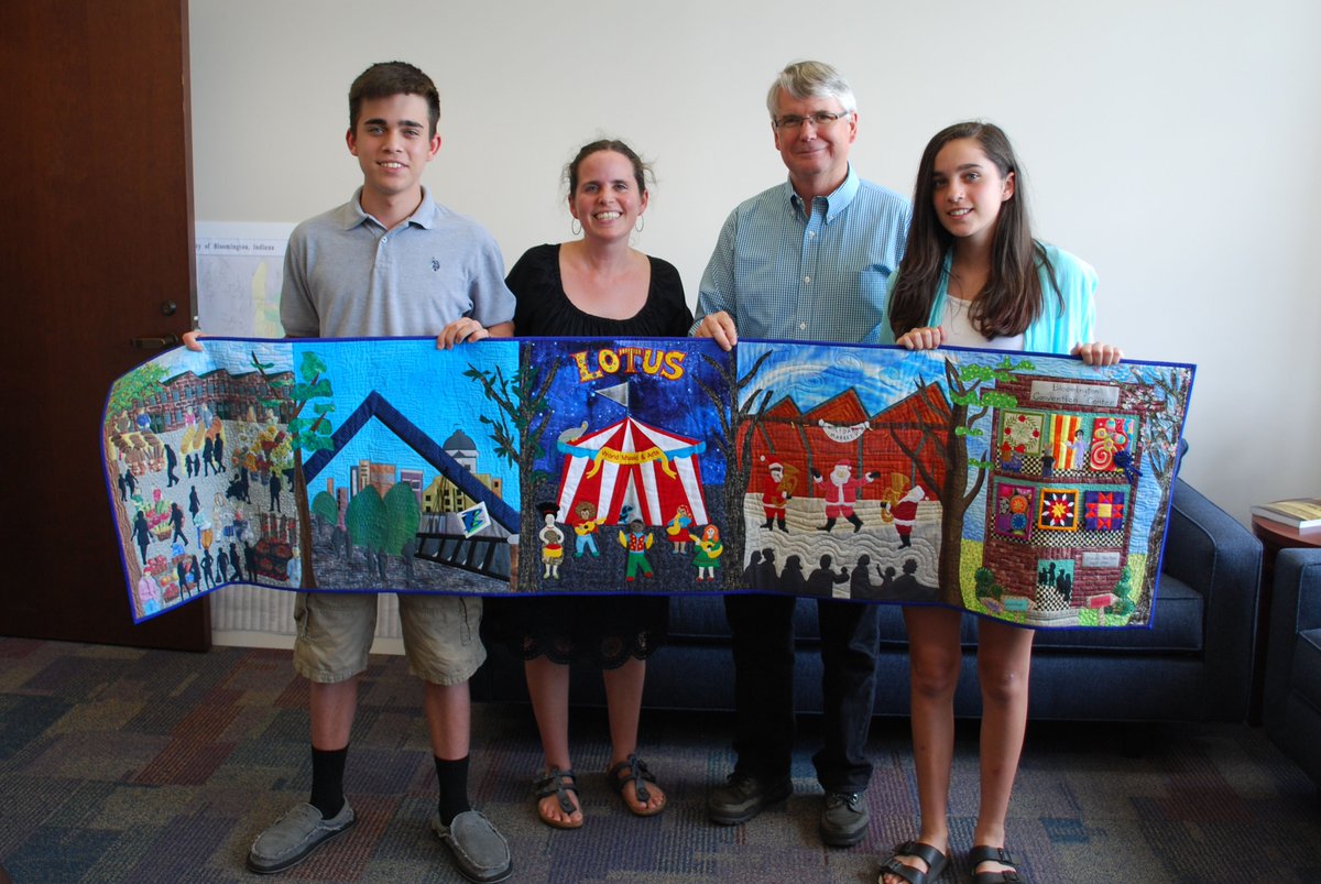 citybloomington's tweet image. Quilters Without Borders delivered this stunning quilt highlighting iconic images of Bloomington to Mayor Hamilton.
