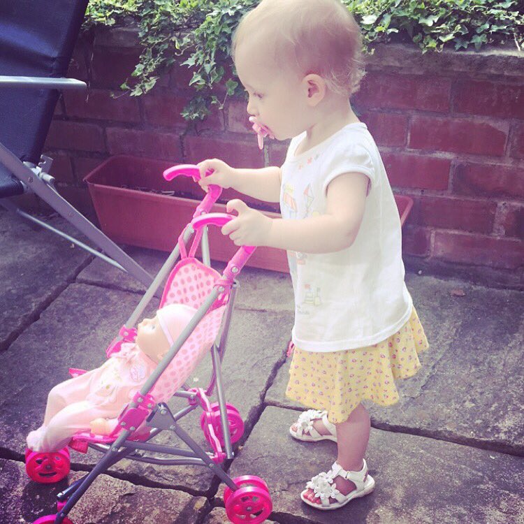 Taking her baby a walk