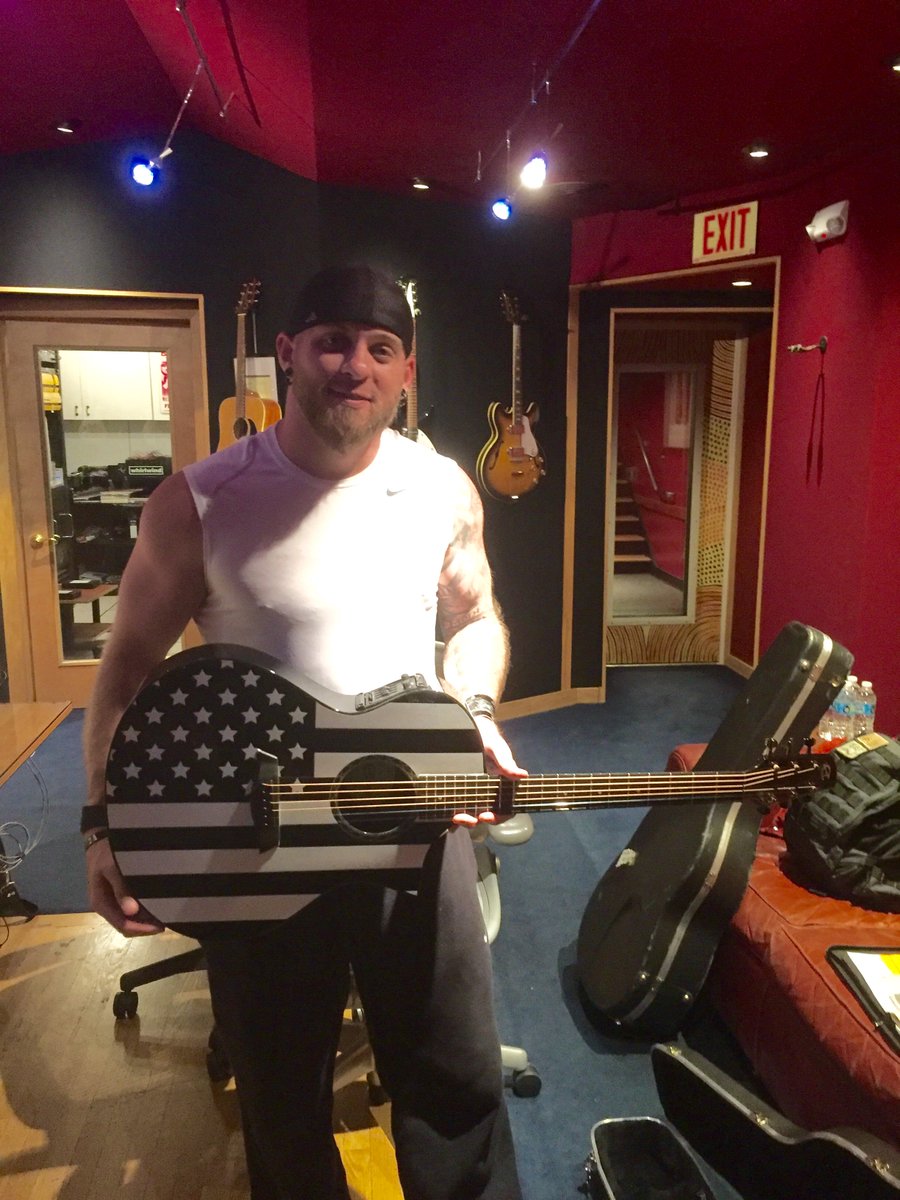 CAGuitars's tweet photo. .@BrantleyGilbert with his new custom painted Composite Acoustics GX model guitar! https://t.co/XMyqjGd9SU