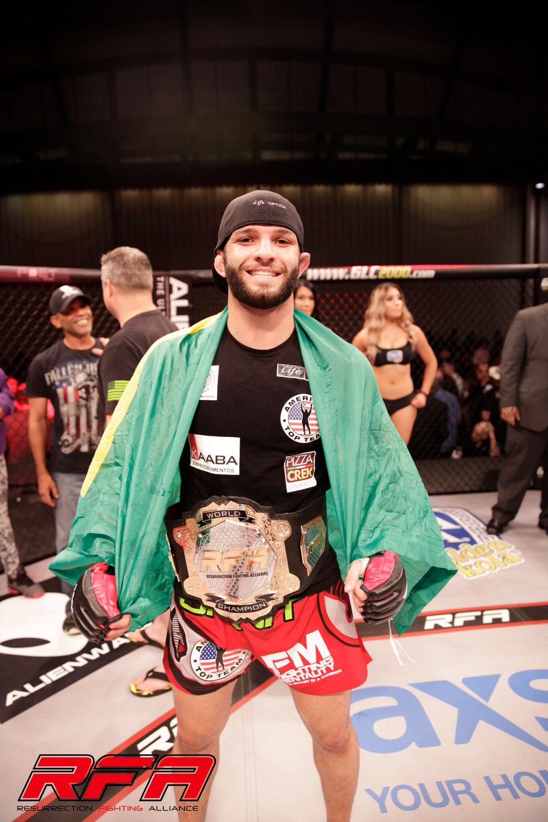 RFAfighting's tweet photo. #TitleTuesday:
Congrats to #RFA 155 lbs. champion @ThiagoMoisesMMA on defending his title at #RFA38!
#andSTILL 🇧🇷 https://t.co/PHWwkCWndk
