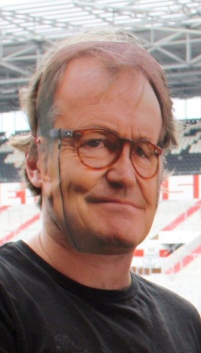 SundayShoutsFC's tweet photo. St Pauli's boss couldn't go to the unveiling of their new signing, so they stuck a mask on a random bloke instead. 😂 https://t.co/1zAoW1IvNE
