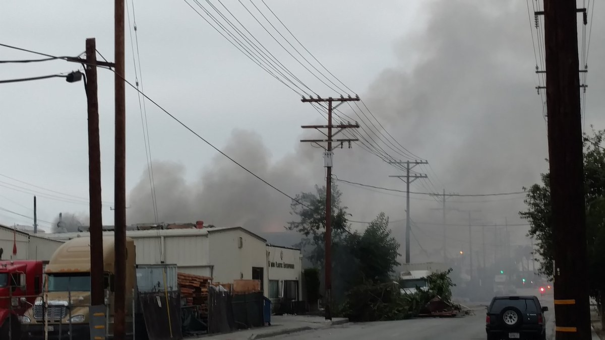 LASDHQ's tweet photo. #Maywood fire still burning, evacuations still in effect. Please stay away from area. #PublicSafety #LASD https://t.co/Ug52ciKKbX