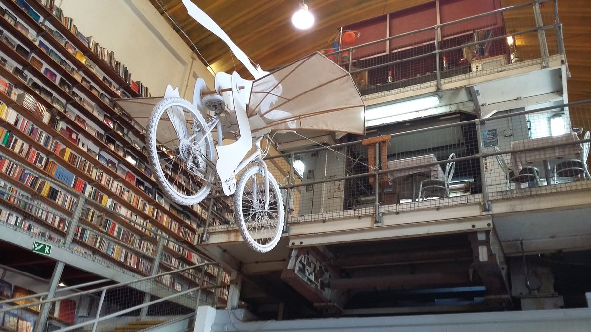 A rotative press on the first floor... 45,000 titles in stock here - and the sky rider's wings move!