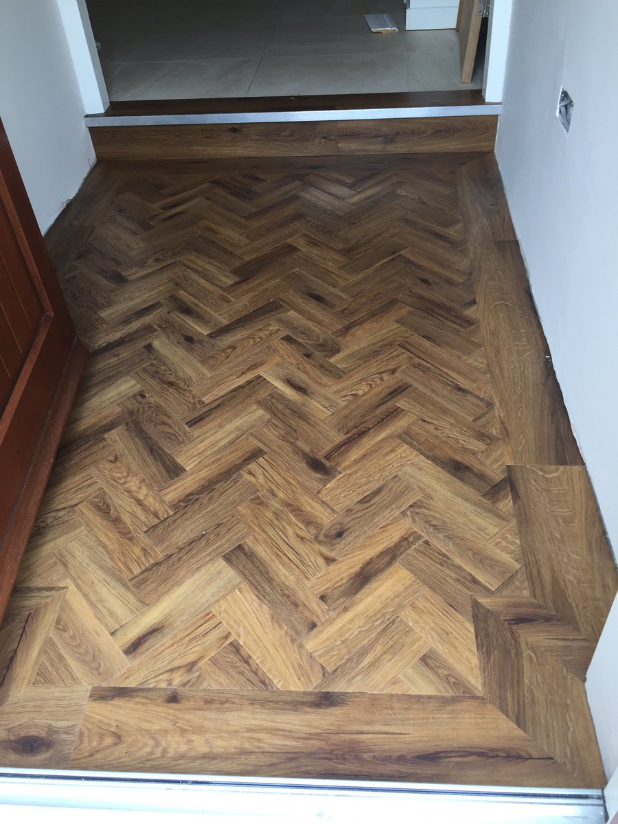 ClewarthW's tweet photo. Art select herringbone from @KarndeanFloors  in a porch using High temp adhesive. https://t.co/UIuSMa8GGq