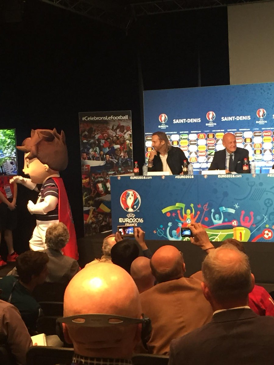 McDonnellDan's tweet photo. David Guetta and Pierluigi Collina side by side at Euro 2016 launch press conference. Collina loving life. https://t.co/g2YUGbvgTq