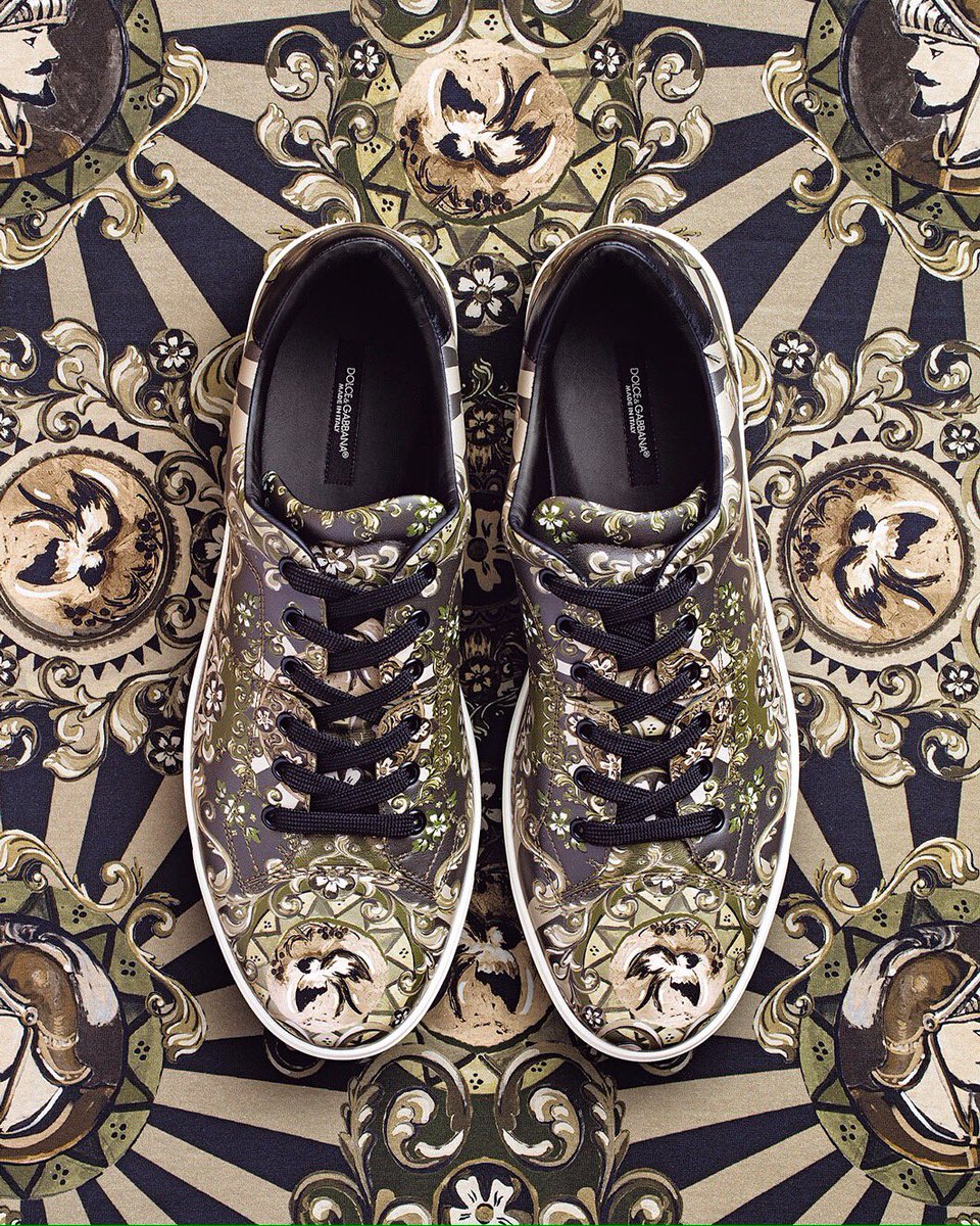dolcegabbana's tweet photo. The #DGSicilianGarden print enhances unique sneakers. https://t.co/F9lpjKD9ln