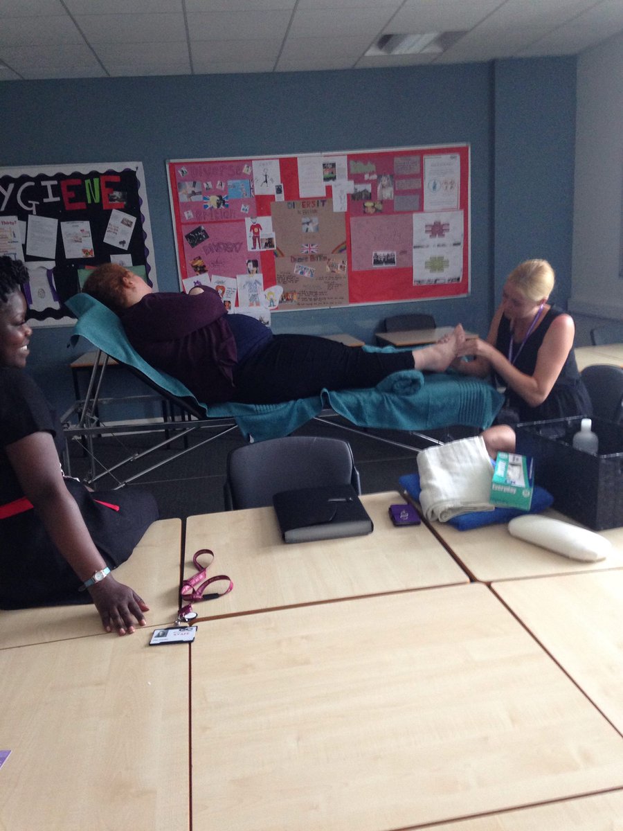 Ceri Evans demonstrating reflexology treatment as part of her talk with L1 Hair and Beauty students #GCThinkBig