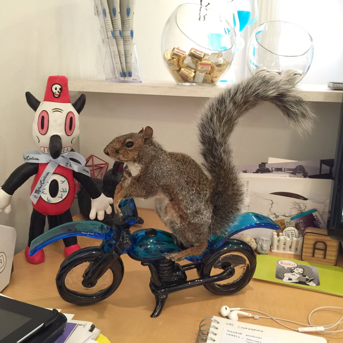 Doesn't everyone have a squirrel on a glass motorcycle on their desk? #thesquirrels #GASCorning #artscenehere