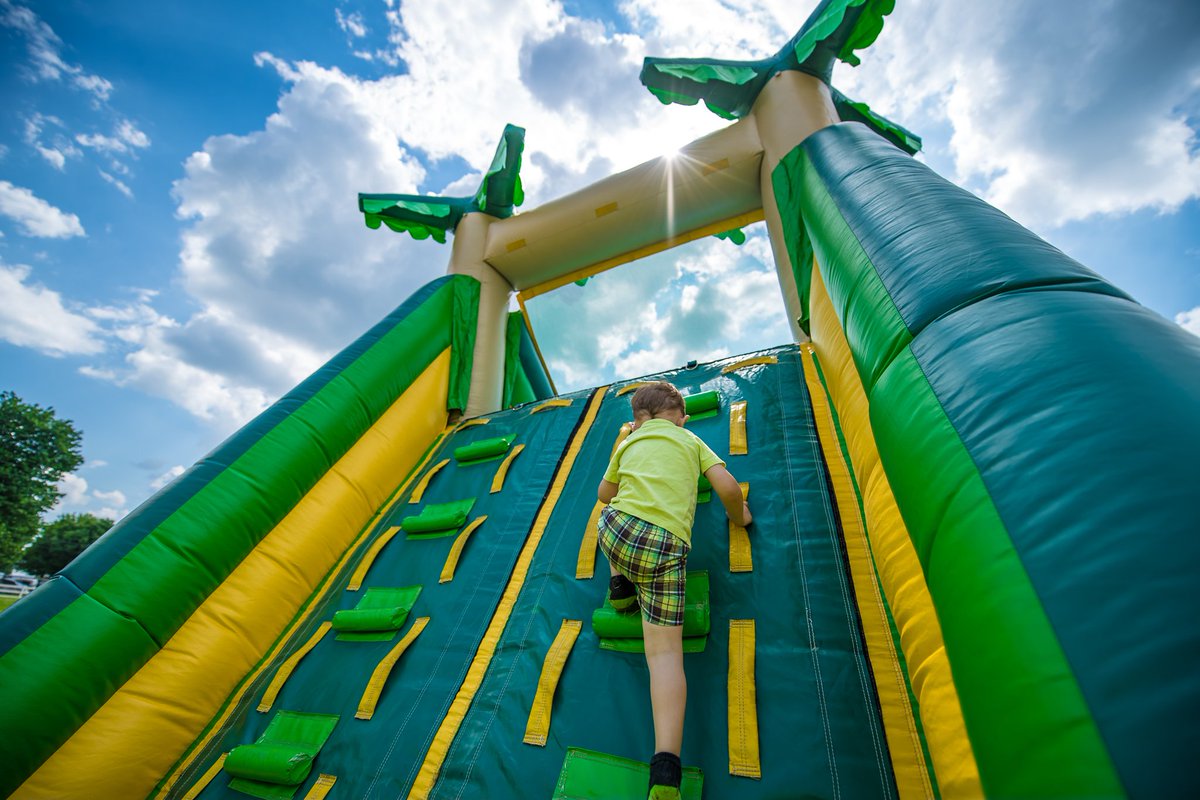 PyroFest's tweet image. Climbing to the top of the inflatable mountain! #PNCKidsZone