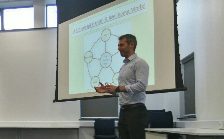 NHSSomerset's tweet image. Wells GP, Dr Murdock Campbell, sets out importance of wellbeing and not just treating disease. #somersetccg