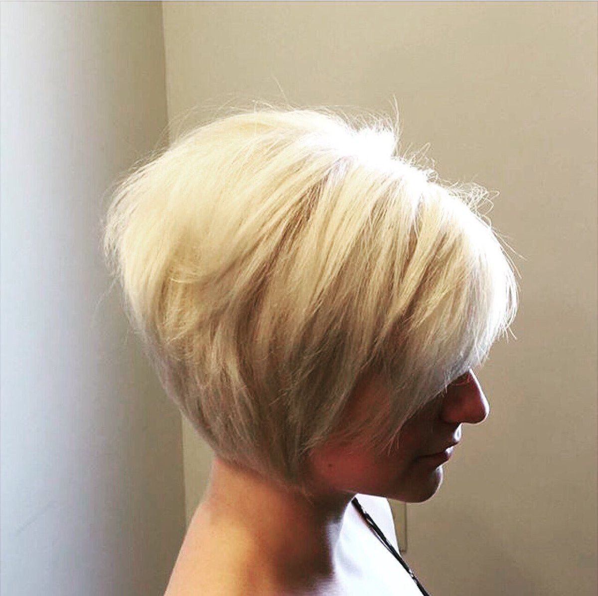 Kylie transformed this woman's hair into a beautiful platinum blonde bob and will do it for you too!! Call today!!