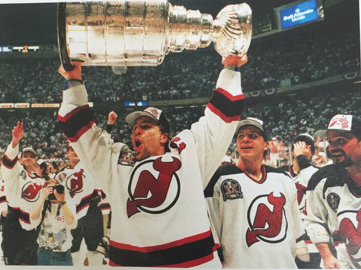 I look on as new <a href="/mnwild/">Minnesota Wild</a> Asst Coach Scott Stevens celebrates  #1995