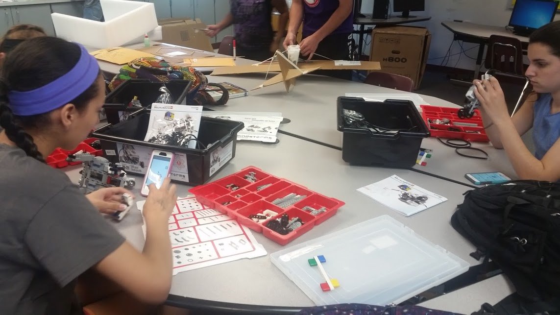 Girls in <a href="/KarenConlin/">Karen Conlin</a> IB Design &amp;Tech class building &amp; programming #EV3 robots #FCPSSTEAM