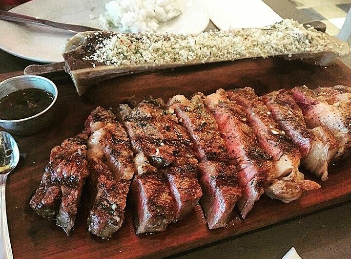 CueModernBBQ's tweet photo. Zooming in on the Ribeye but not losing sight of the foot-long bone marrow. #cuemodernbbq #getyourcueon 📷 @rhunzie https://t.co/FEajxtUEsf