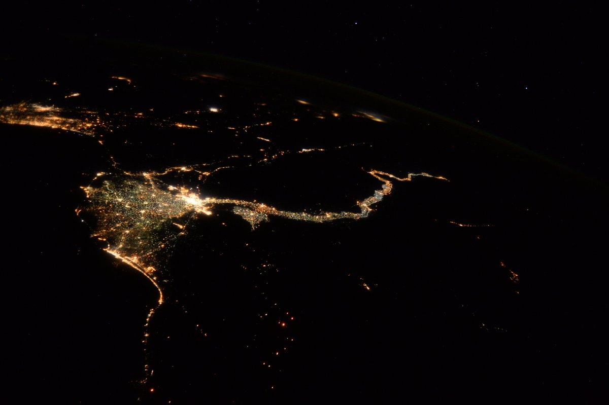 astro_timpeake's tweet image. Lights along the Nile stretching into the distance from #Cairo