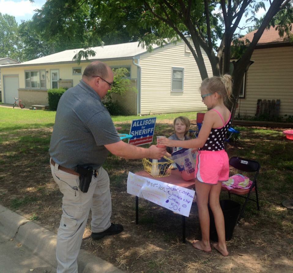 allison4sheriff's tweet photo. Sergeant Allison supporting a local lemonade stand. Allison for sheriff! https://t.co/VG1BDc0zRB