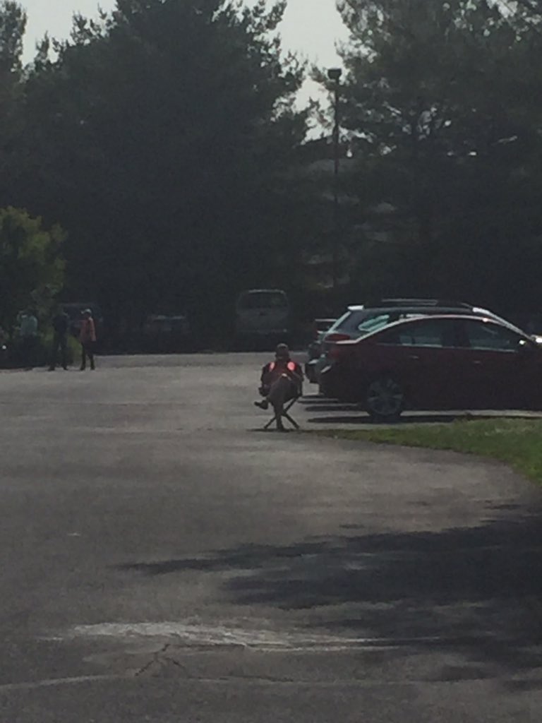 ProLifeFutureLV's tweet photo. A guy from the abortion clinic is literally sitting there video taping us. https://t.co/7kImH2Bsso