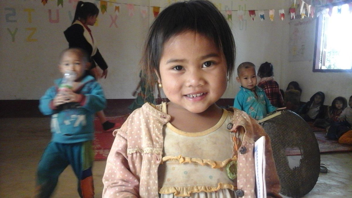 WFP's tweet photo. A smile from Sivanh, 5 year old student from #Laos, after finishing her mid-morning snack supported by @USDA. https://t.co/PBW7yZXhk2