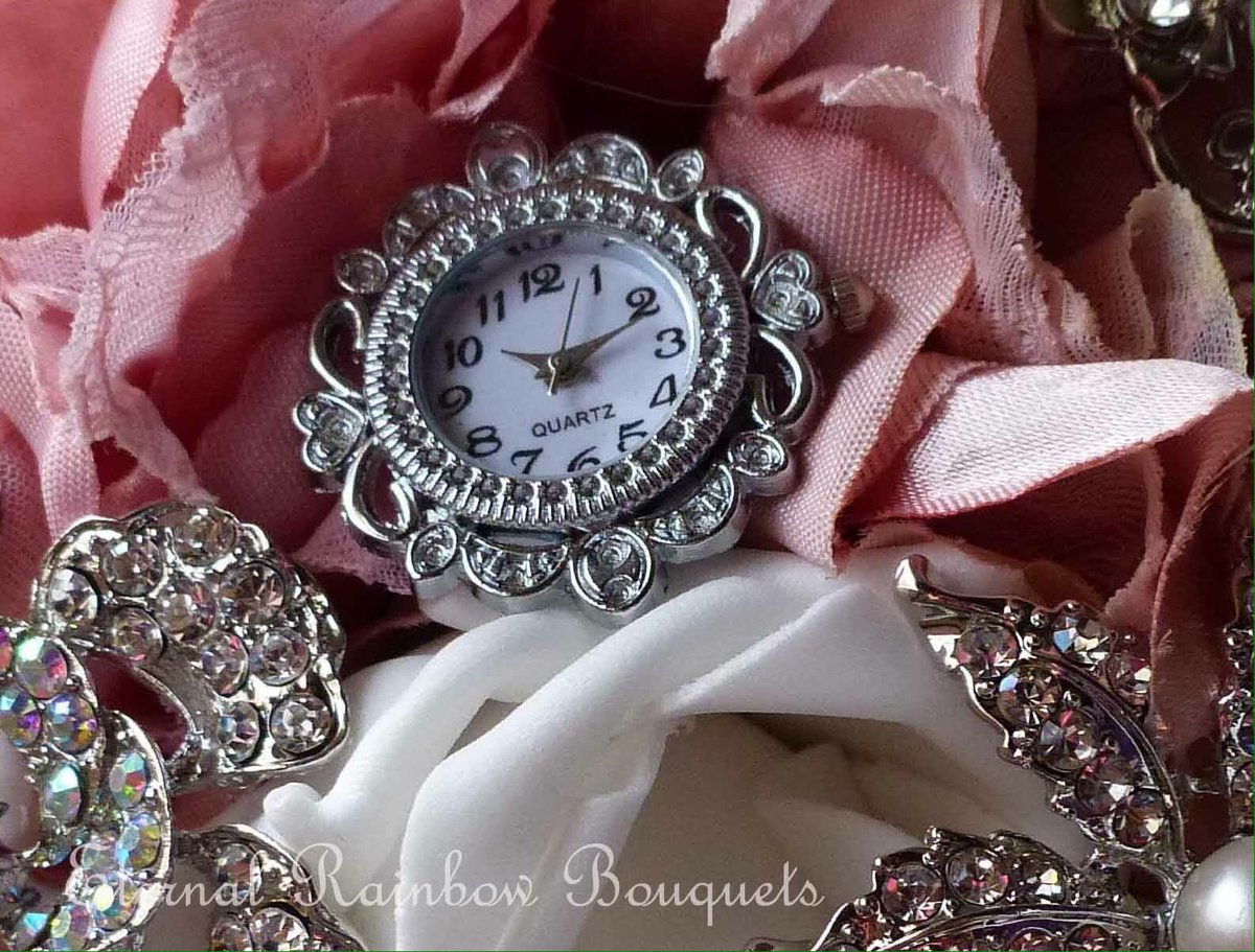 A lovely addition to our bouquets - working clock faces.  #broochbouquets