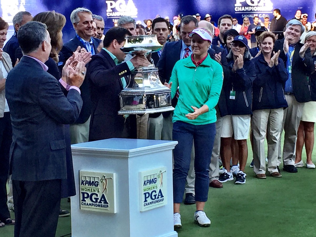 LPGA's tweet photo. .@KPMGWomensPGA champion @BrookeHenderson accepts her first major trophy! Congrats! https://t.co/LAyM2SvNBo