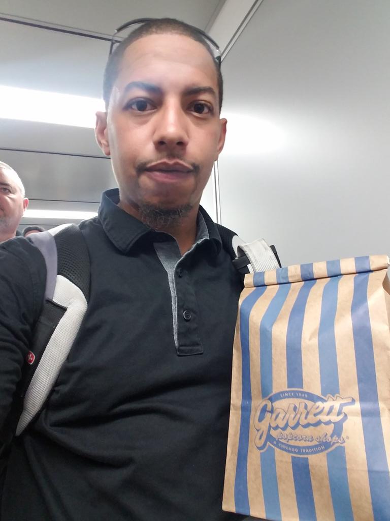 TheRealest_InIt's tweet photo. Off to Bean Town, and taking Garrett's with me for the flight crew! @GarrettPopcorn https://t.co/1iGkZAVrHo