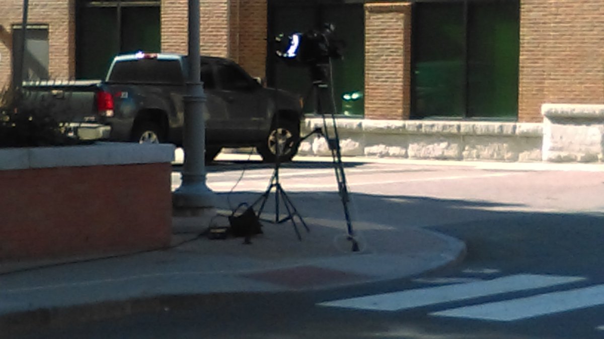 125 6th Street being surrounded by the media...