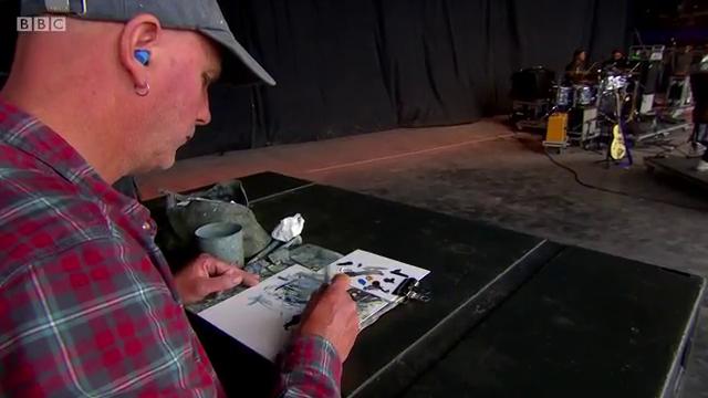 BBCR1's tweet photo. We spotted an actual artist on the Pyramid Stage earlier, so we hired our own* to draw @the1975. Good or what? https://t.co/5JkWYctA2V