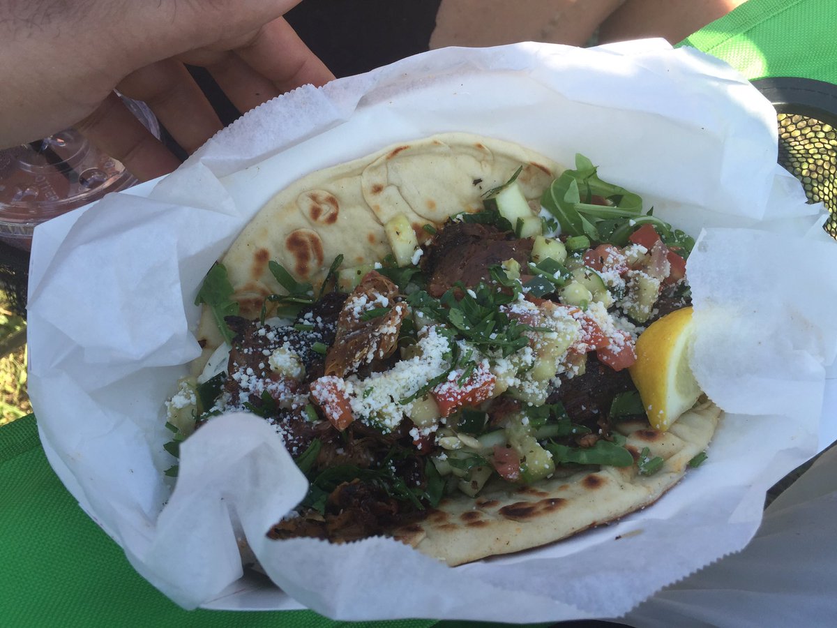 ZikJackson's tweet photo. Delicious braised lamb pita and shrimp PoBoy from @5Loaves2FishTrk @ccontheweb #FreedomFestJax #ffjax https://t.co/NuU1rh73DV