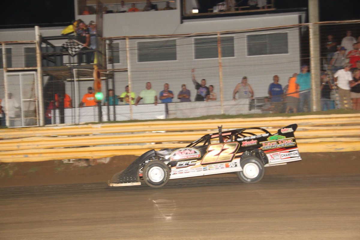 ULTIMATESupers's tweet photo. Great shot of @ChrisFerguson22 crossing the checkers at @Dublin_Speedway . @GeneLefler Photo https://t.co/C6Oq0p6Vbz