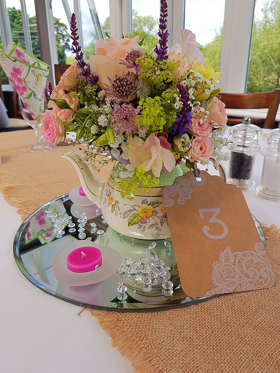 CupsLoveSaucers's tweet photo. Teapots aren't just for Tea! Lovely centrepieces from yesterday's function. https://t.co/J0JZ8ztdoC