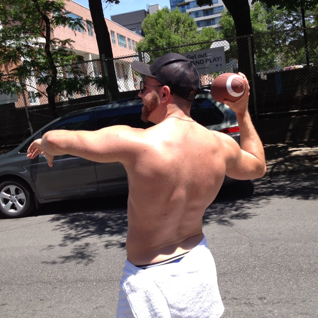 Our model Matty gets a little football🏈 practice in on <a href="/ChurchWellesley/">The Village - Toronto, ON. Canada</a>. <a href="/OutSportToronto/">OutSport Toronto</a> #CircusSoGay🌈 #Pride2016
