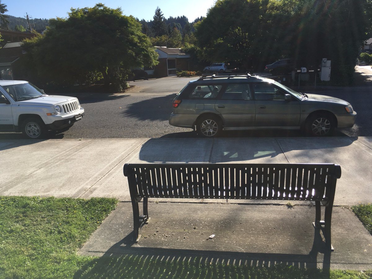benchesofissy's tweet image. Sit here on a rainy day and watch the water soak into Rainier Blvd's permeable pavement.