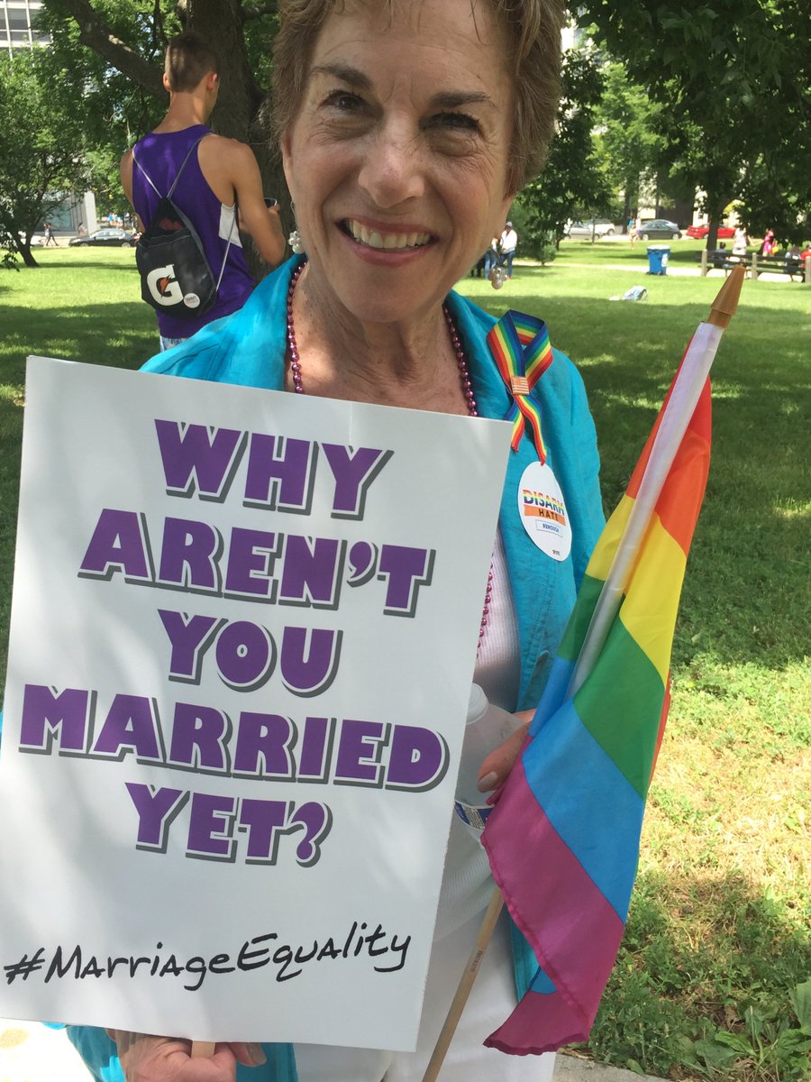 cookcountyclerk's tweet photo. US Rep. @janschakowsky is such a fan of #marriageequality she posed with both signs! #CookCountyPride #JourneyTo10k https://t.co/u7kHoSQ3z3