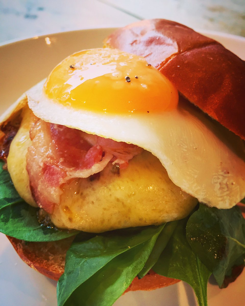 Breakfast burger - sausage patty, bacon, fried egg, hollandaise butter, smoked cheddar, spinach and chilli jam 👌