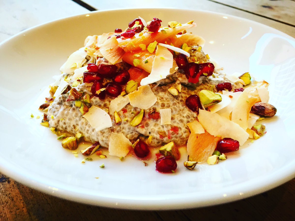 Chia seed and coconut pudding (one of my personal favourites) with poached rhubarb, pomegranate and pistachios 😜