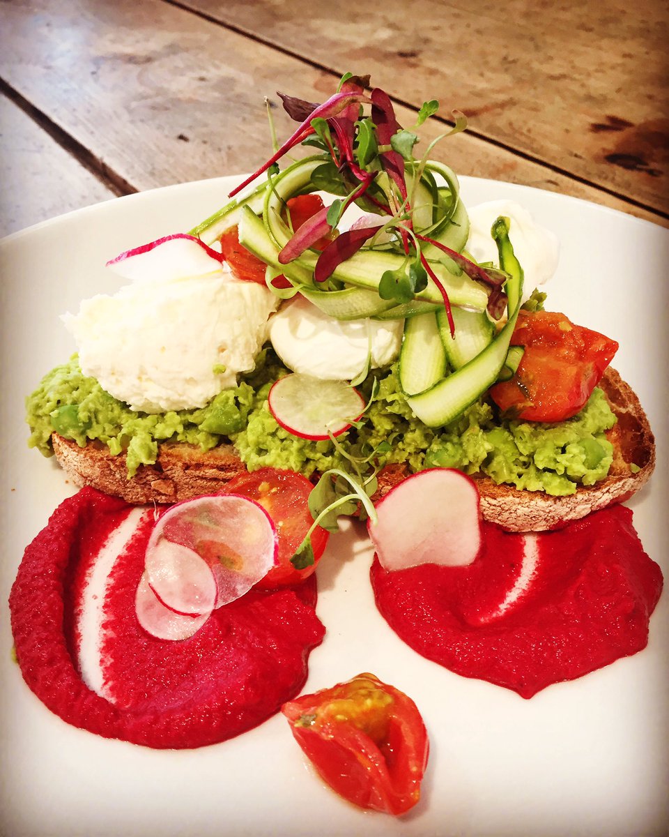 Pea and goat's cheese bruschetta -asparagus, broad beans, poached egg, beetroot hummus and confit cherry tomatoes 😍