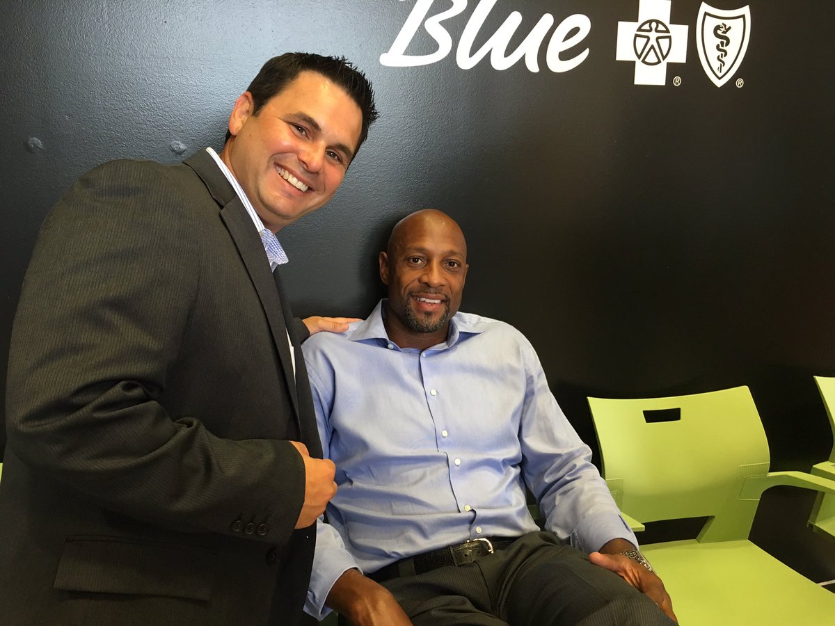 FLBlue's tweet photo. Our #Miami Retail Center Lead @Efra7777 with one our beloved @MiamiHEAT players! #LetsGoHeat https://t.co/LBwDwzJIRV