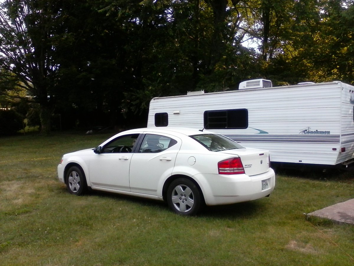 roofingbycombs's tweet photo. My New #Car next to the #Camper. #dodgeadvenger https://t.co/LqC1QXYefY