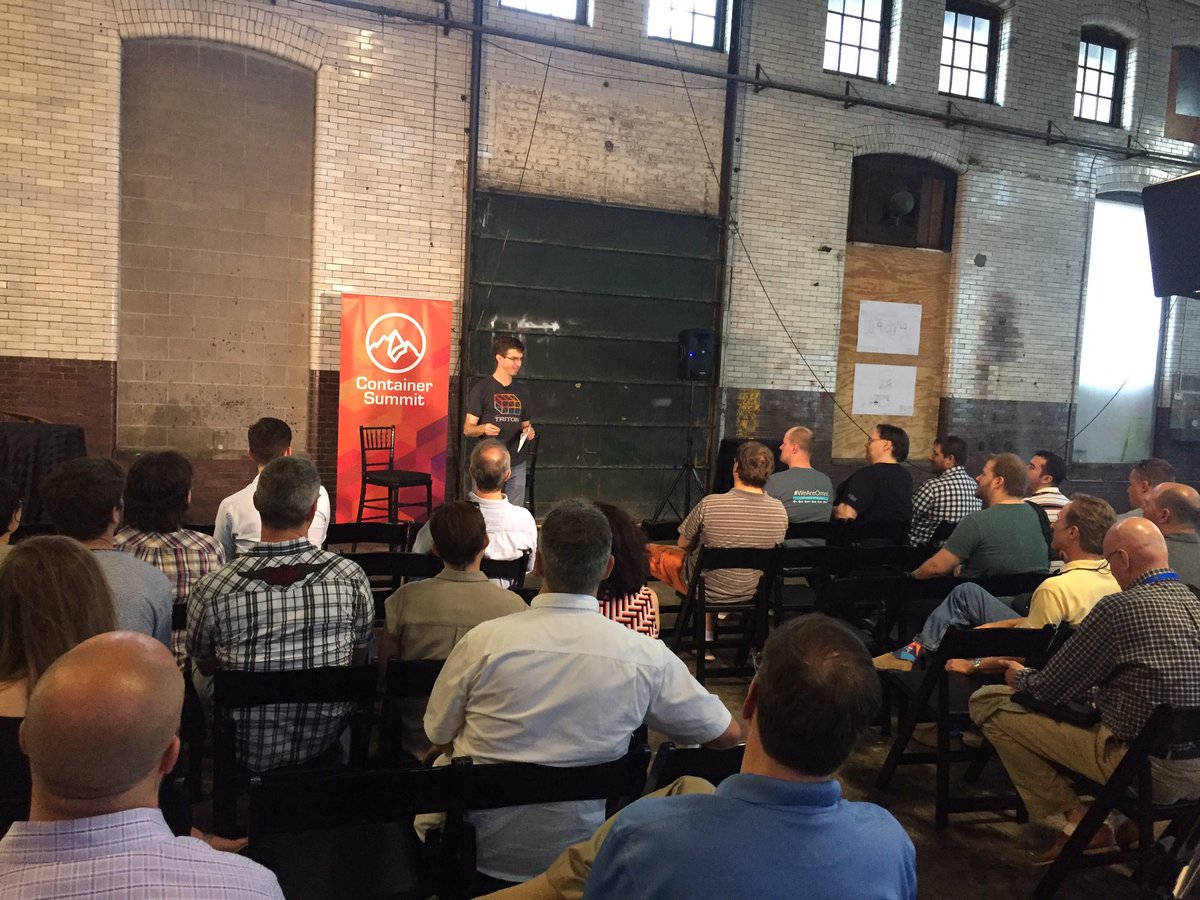 Packed house in Milwaukee!  <a href="/bcantrill/">Bryan Cantrill</a> talking about this historic CityLightsBrewery! #ContainerSummit